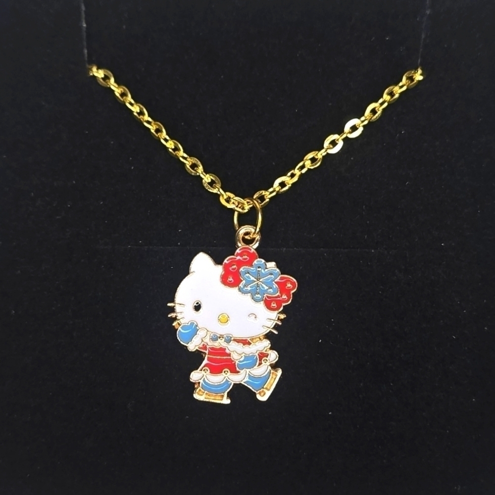 Hello Kitty Necklace Winter Themed Skating Gold Tone